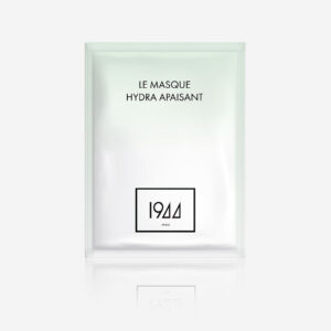 Masque visage Le Masque Hydra Apaisant 1944 Paris en sachet vert clair, photographié sur fond gris.